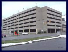 Turn north on Reid Ave. and enter the garage at the red arrow.
